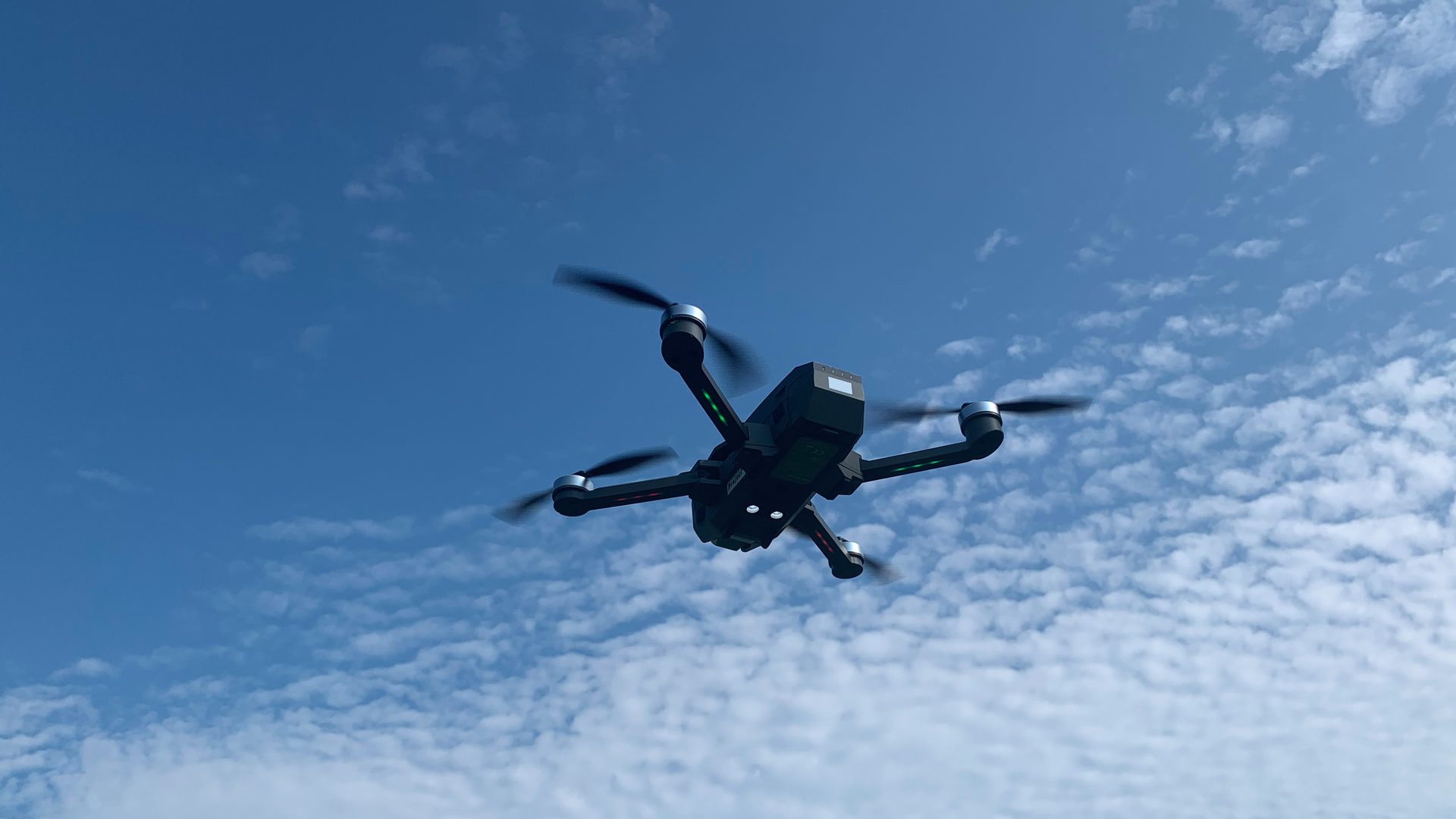 Drone flying in open sky